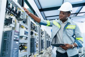 Employee working wearing a hardhat