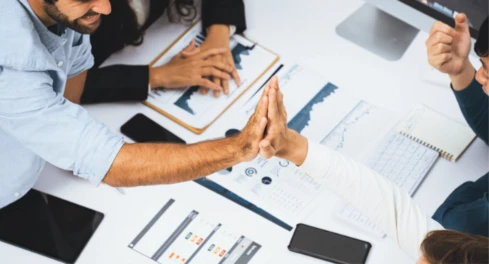 modern work high five hands