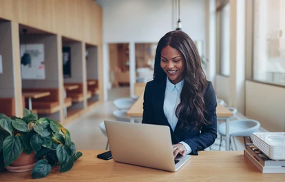 Lady working at a laptop